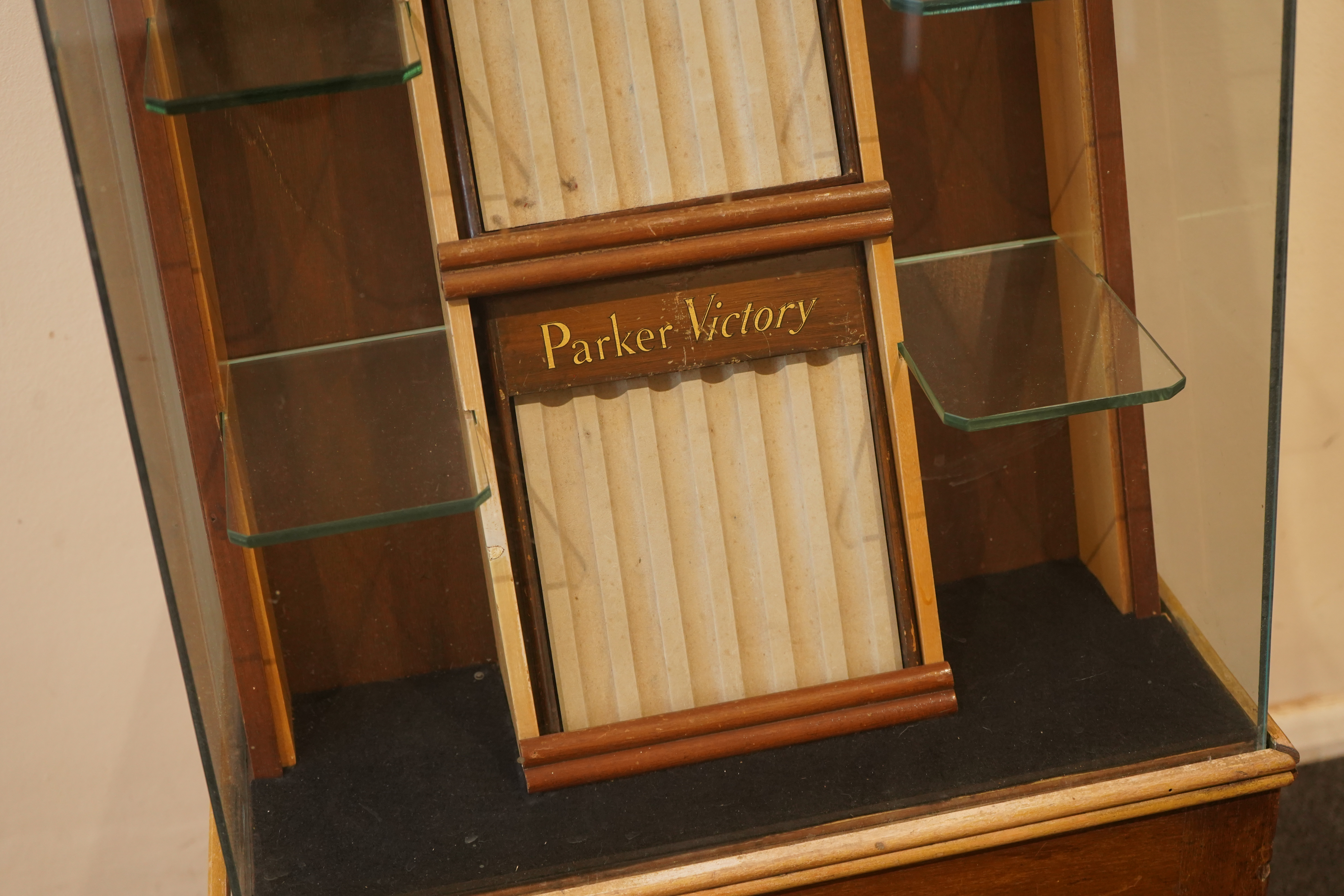 A very rare Parker Shop display cabinet, floor mounted c.1940's, with three trays and glass shelves for Parker '51's', 'Dufolds' and 'Victory's'